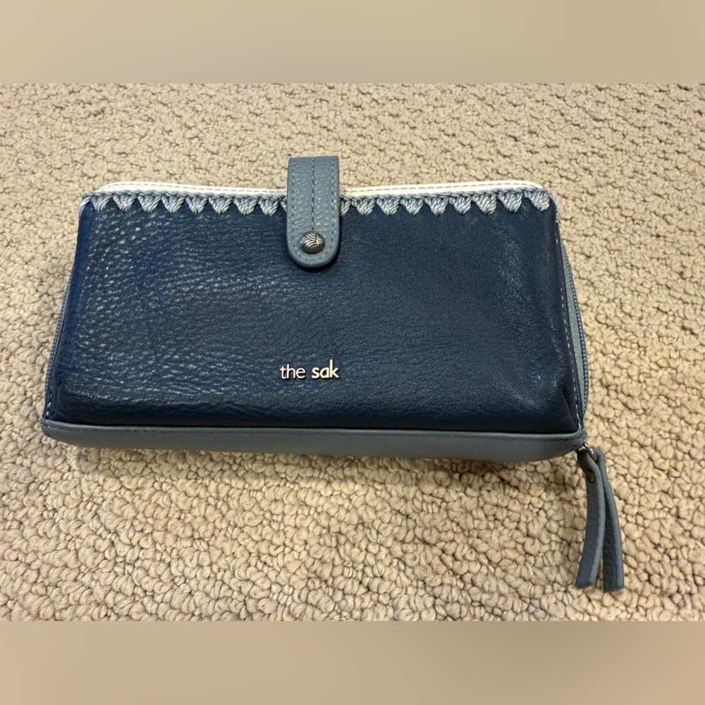 The Sak Dark Blue and Gray Smart Phone Wallet. New without tags